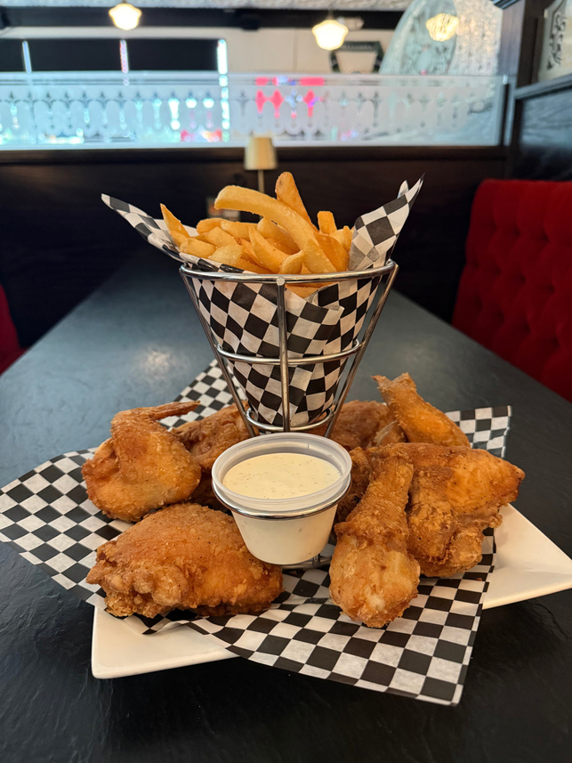 Golden Broaster chicken with fries and dipping sauce at Grady's Public House